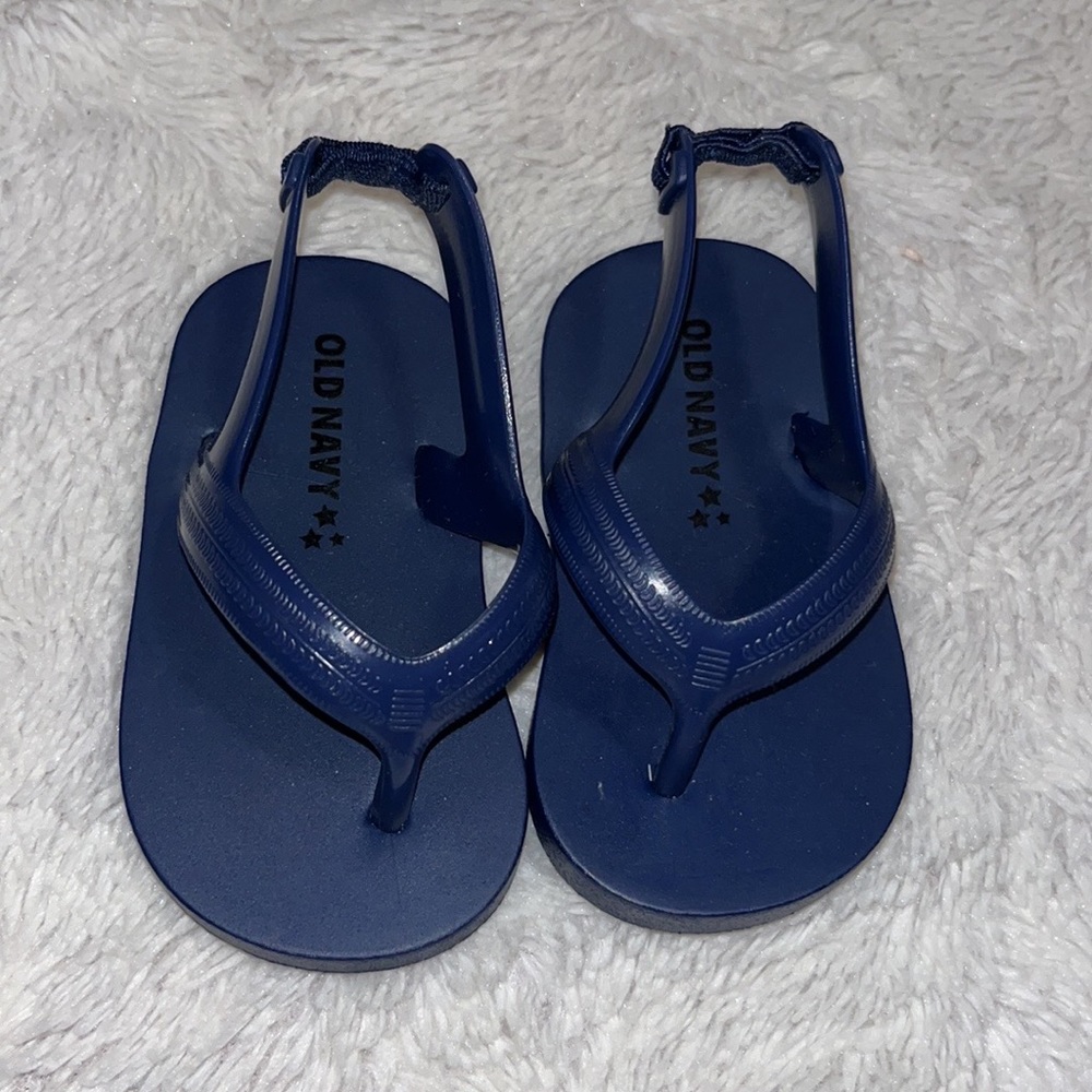old navy blue size 3 flip flops with strap
